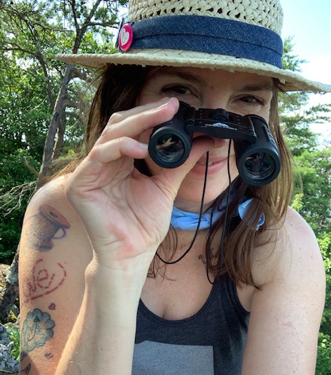 Amy with binoculars.